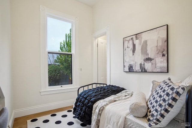 bedroom featuring hardwood / wood-style flooring