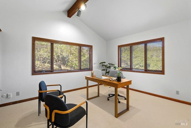 carpeted office with vaulted ceiling with beams