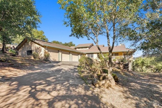 ranch-style home with a garage