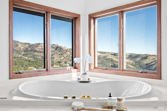 bathroom with a mountain view