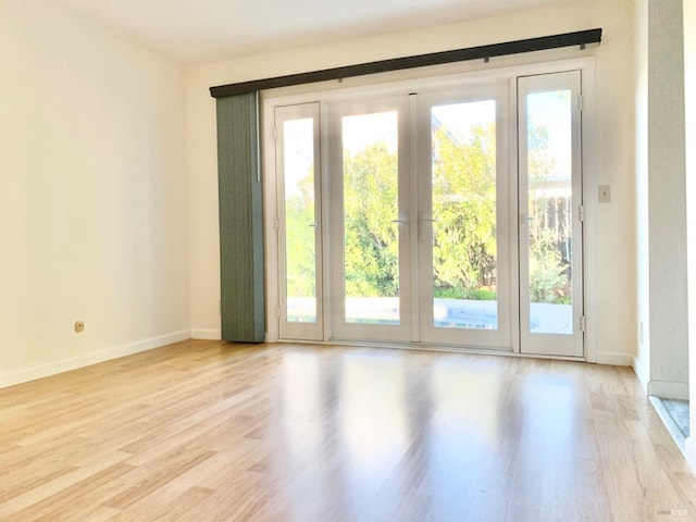 entryway with light wood-type flooring