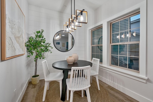 dining area featuring wood-type flooring