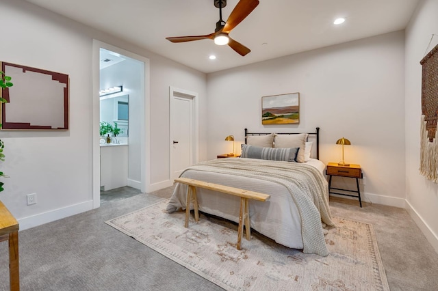 bedroom featuring ceiling fan and light colored carpet