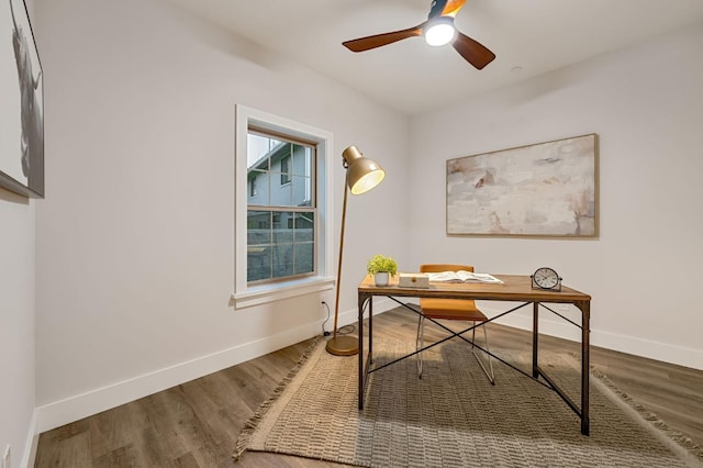 office with ceiling fan and hardwood / wood-style floors