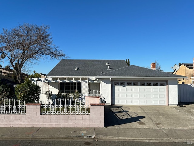 view of front of property featuring a garage