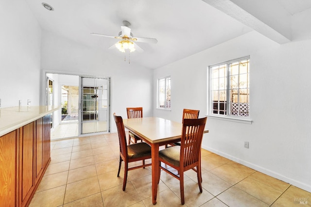 tiled dining room with ceiling fan