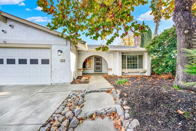 single story home with a garage