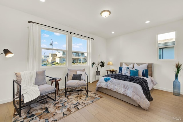 bedroom featuring light wood-type flooring