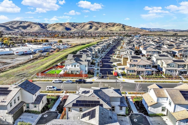 birds eye view of property featuring a mountain view