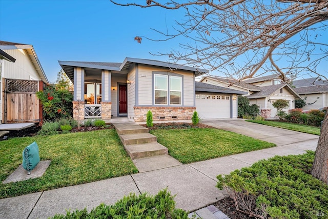 view of front of property with a front lawn and a garage