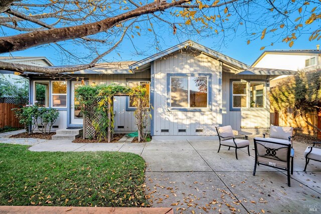 rear view of house with a patio area