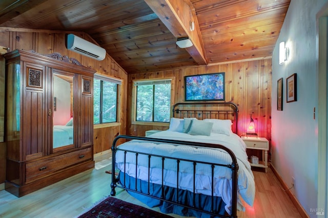 bedroom featuring a wall unit AC, wood walls, wood ceiling, and light wood finished floors