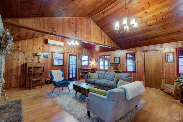 living room featuring an AC wall unit, wood ceiling, and a notable chandelier