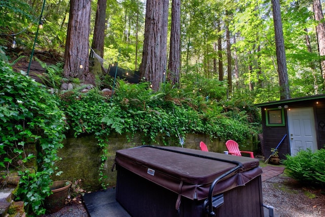 exterior space featuring a hot tub