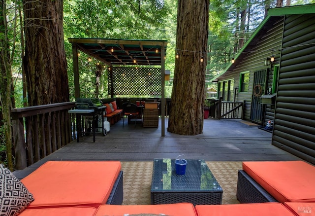 wooden deck with an outdoor living space