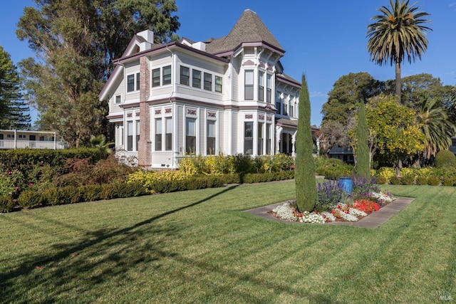 exterior space with a front yard