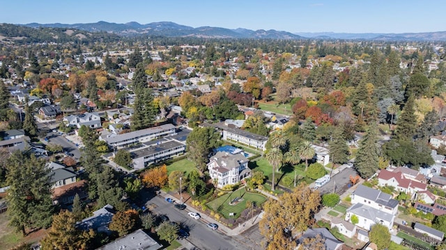 birds eye view of property featuring a mountain view