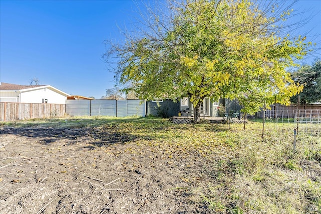 view of yard featuring a fenced backyard