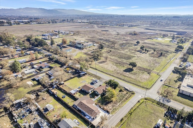 drone / aerial view featuring a mountain view