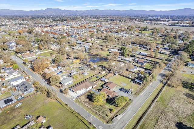 birds eye view of property featuring a residential view and a mountain view