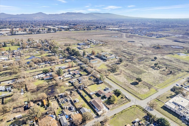 bird's eye view with a mountain view