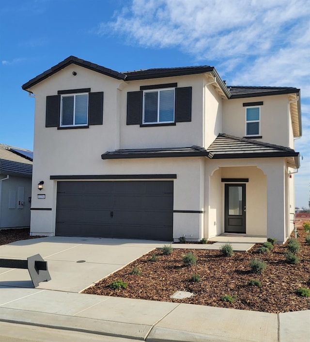 view of property featuring a garage