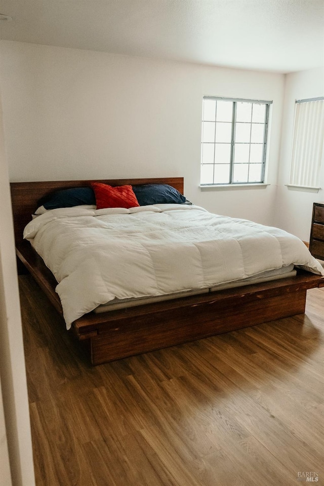 bedroom featuring hardwood / wood-style flooring