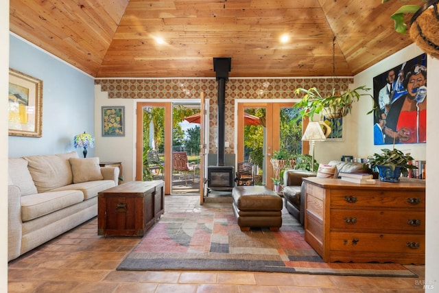 living room with a wood stove, french doors, and wooden ceiling