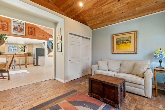 living room featuring wood ceiling and vaulted ceiling