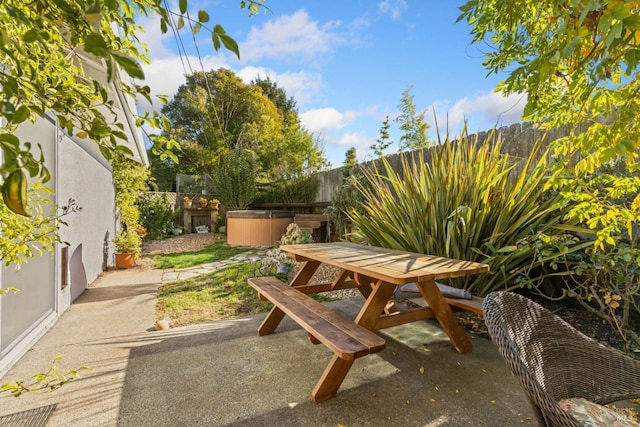 view of patio / terrace featuring a hot tub