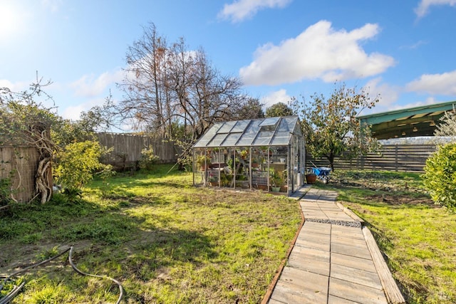 view of yard with an outdoor structure