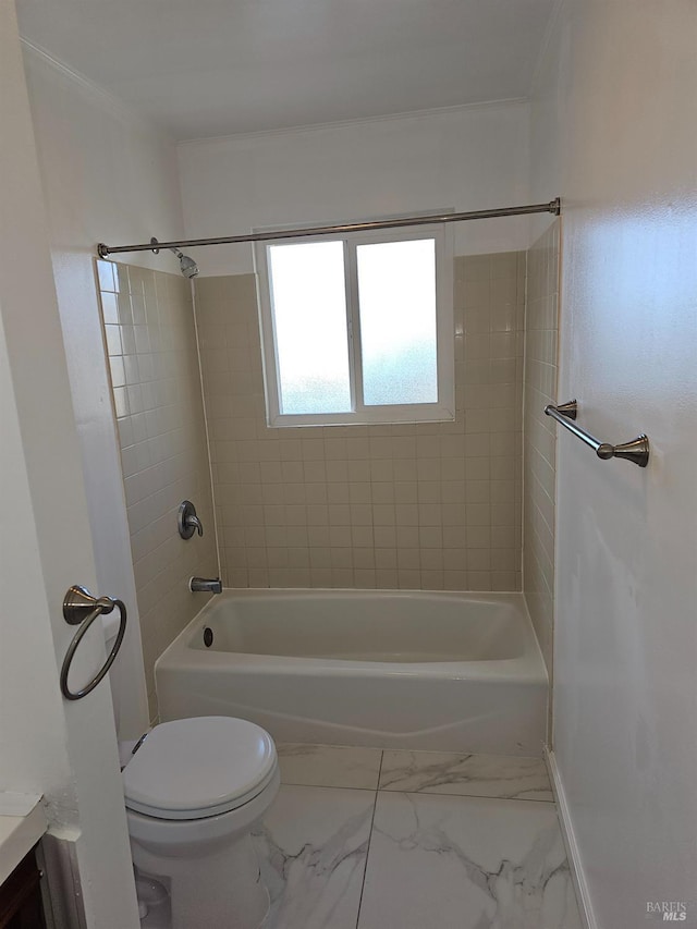 full bathroom with vanity, toilet, tiled shower / bath, and ornamental molding