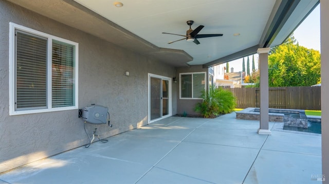 view of patio / terrace with ceiling fan, a fenced backyard, and a fenced in pool