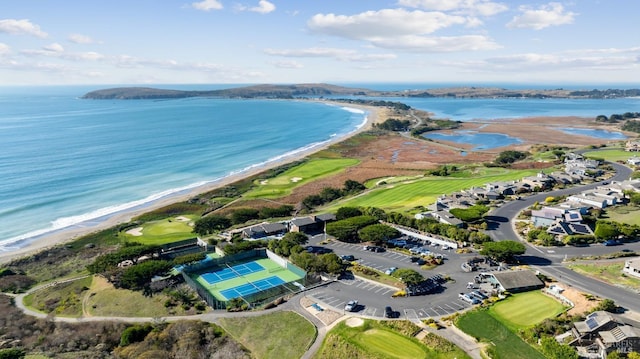 aerial view with a beach view and a water view