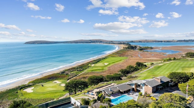 bird's eye view with a water view and a view of the beach