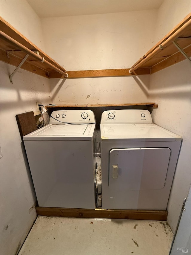 clothes washing area featuring laundry area and independent washer and dryer