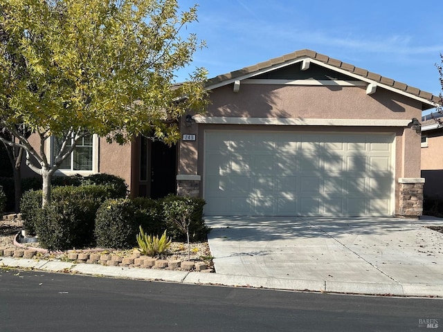 view of front of home featuring a garage