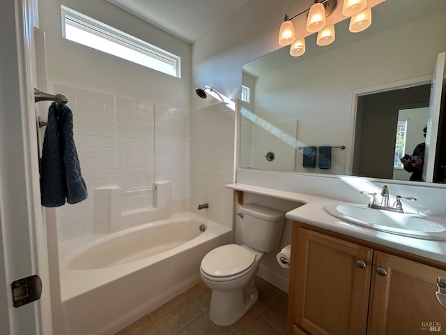 full bathroom featuring tile patterned floors, vanity, toilet, and bathing tub / shower combination