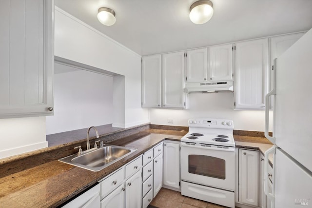 kitchen with light tile patterned flooring, white appliances, white cabinetry, and sink