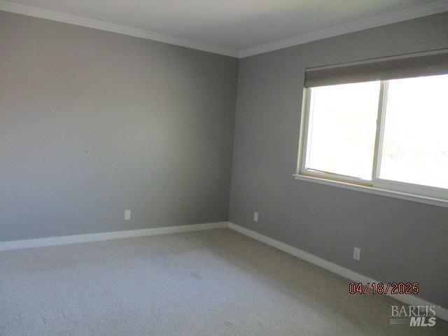 46 Tahoe Cir, Novato, CA 94947 - carpeted spare room featuring baseboards and ornamental molding