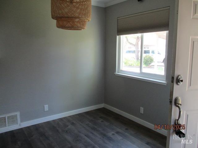 46 Tahoe Cir, Novato, CA 94947 - unfurnished room featuring visible vents, baseboards, and dark wood-type flooring
