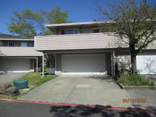 46 Tahoe Cir, Novato, CA 94947 - view of front of home featuring an attached garage, driveway, and stairway