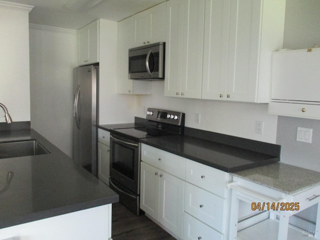 46 Tahoe Cir, Novato, CA 94947 - kitchen featuring white cabinets, stainless steel appliances, crown molding, and a sink