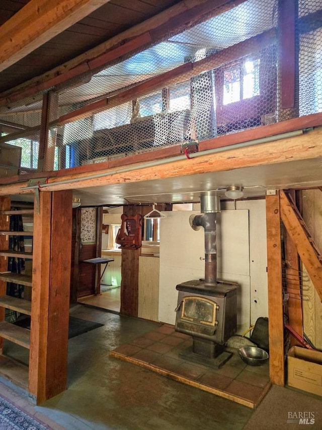 basement featuring a wood stove