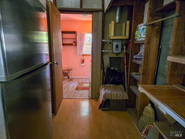 hall featuring wood finished floors