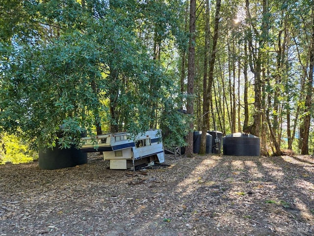 29500 Timberline Rd, Willits, CA 95490 - view of yard featuring exterior structure, central AC unit, and an outbuilding