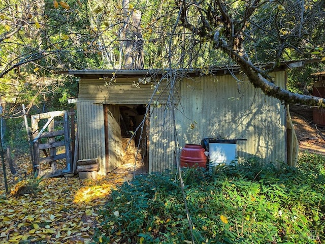 view of outbuilding featuring an outdoor structure