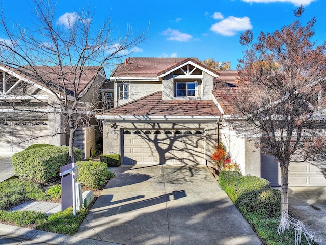 front of property with a garage