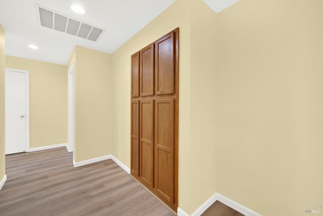 hall featuring light hardwood / wood-style flooring