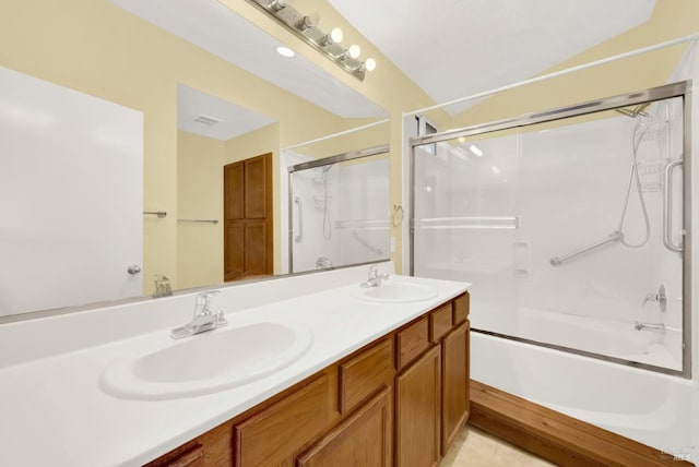 bathroom featuring shower / bath combination with glass door, vanity, and tile patterned floors